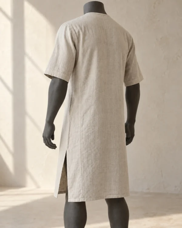 Rear view of the Bram Short-Sleeve Linen Tunic showing the relaxed body and side vents