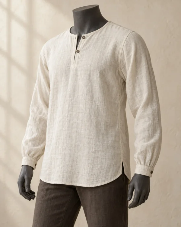 Caelan Linen Costume Shirt in warm off-white with a buttoned neck and gathered cuffs