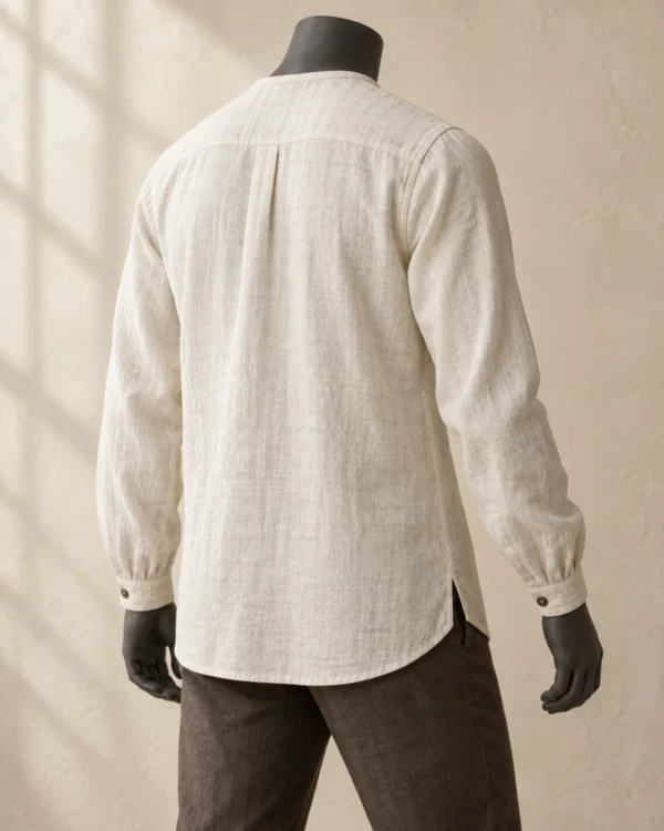 Rear view of the Caelan Linen Costume Shirt showing the relaxed fit and curved hem