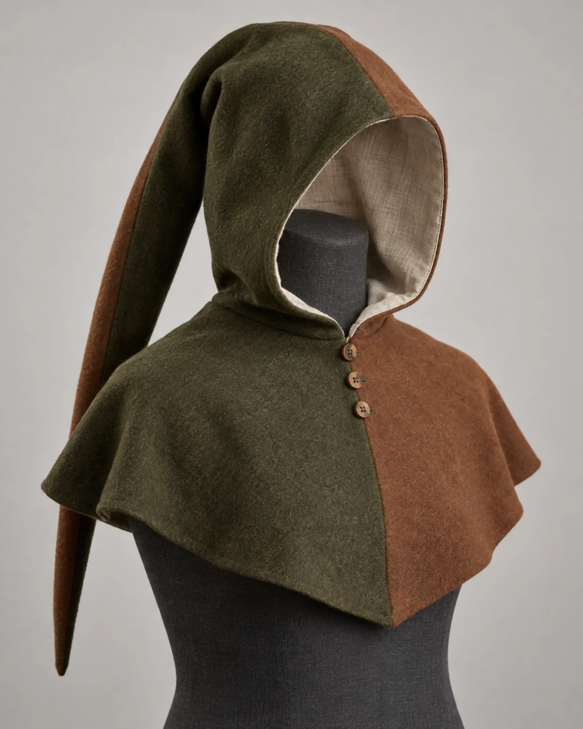 fenwick-mi-parti-wool-hood-olive-and-russet-front Fenwick Mi-Parti Wool Hood in olive and russet with a split-color tail and three buttons