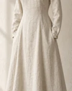 Close-up of the Isolde Fitted Linen Costume Underdress showing the shaped waist, sleeve cuffs and full skirt