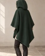 Rear view of the Moorland Hooded Wool Poncho showing the hood and diamond-shaped hem