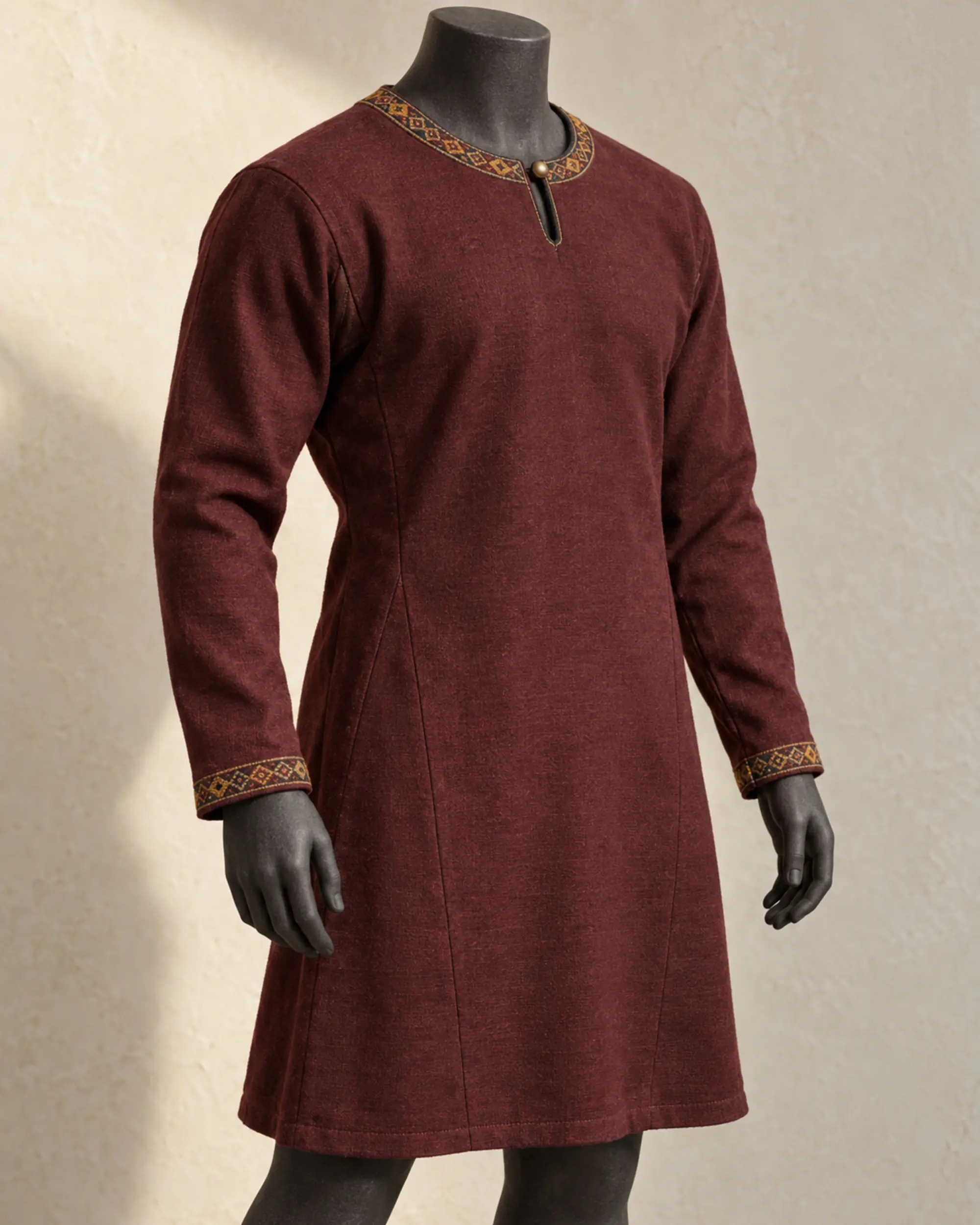 rorik-wool-trim-tunic-oxblood-burgundy-front Rorik Wool-Trim Tunic in oxblood burgundy with patterned neckline and cuff trim