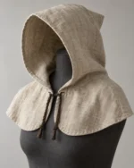 Rowan Linen Peasant Hood in natural flax with a rounded mantle and braided ties