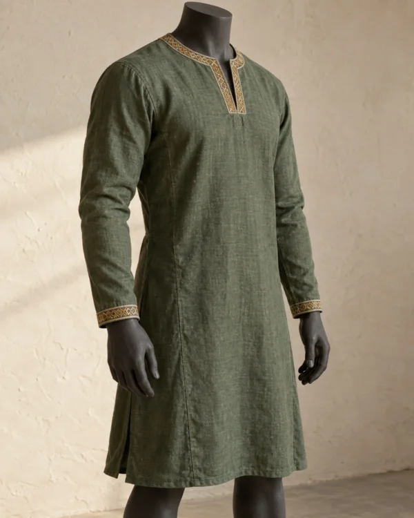 Soren Embroidered Linen Tunic in moss green with patterned neckline and cuff borders