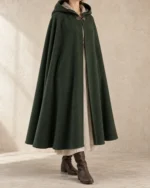 Thornmere Wool Traveler Cloak in forest green with a deep hood and calf-length sweep