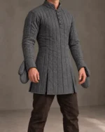 Fenroth Charcoal quilted gambeson, front view with released hands and integral soft mitten ends