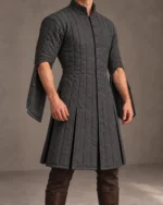 Larkspur elbow-open festival gambeson in Charcoal, front three-quarter view