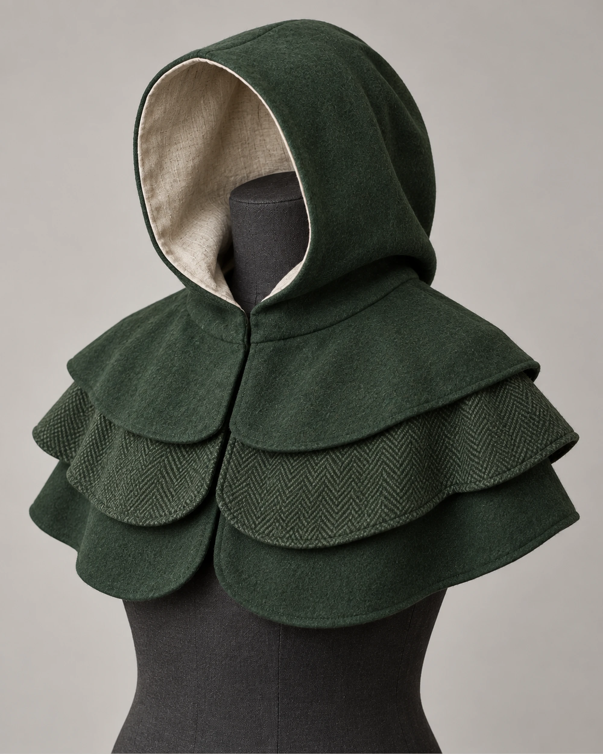 Rookmere Three-Tier Wool Mantle Hood - Forest Green, front three-quarter view Rookmere Forest Green three-tier wool mantle hood with rounded crown